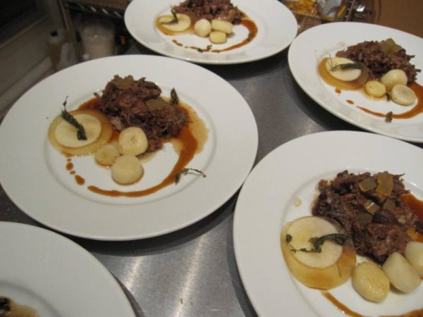 Oxtail with reduction, apple, sunchokes and crisp verbana leaves