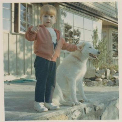 Timothy as a toddler with his pet dog